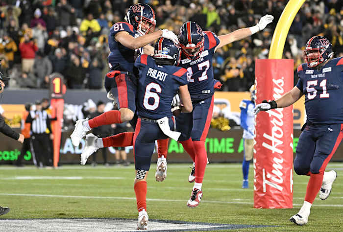 Nov 19, 2023; Hamilton, Ontario, CAN; Montreal Alouettes wide receiver Tyson Philpot (6) celebrates with wide receivers Mack Austin (81) and Cole Spieker (17) after scoring the winning touchdown against the Winnipeg Blue Bombers with 13 seconds left in the second half at Tim Hortons Field. Mandatory Credit: Dan Hamilton-USA TODAY Sports
